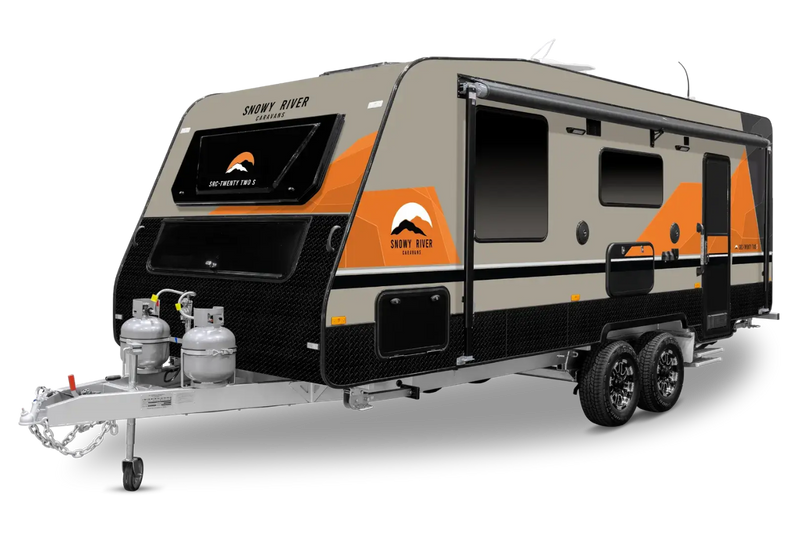Snowy River caravan with orange and black design on a white background